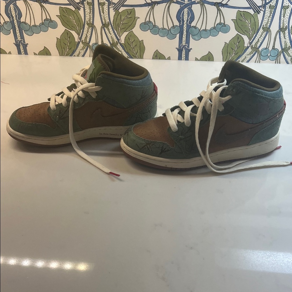 Nike Air Jordan High-Tops with Green and Brown Design